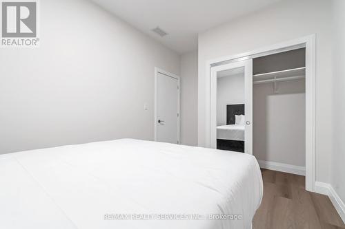#8 - 30 Dean Park Road, Toronto, ON - Indoor Photo Showing Bedroom