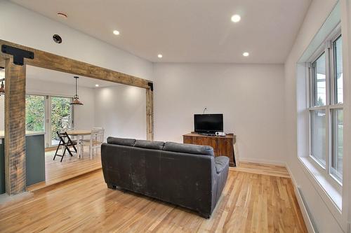 Living room - 106 Ch. Southière, Magog, QC - Indoor With Fireplace