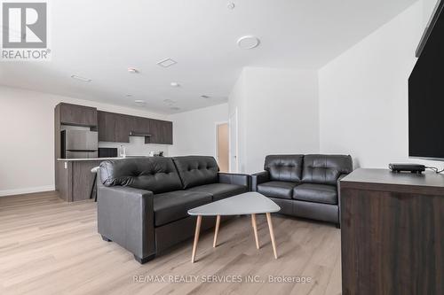 #2 - 30 Dean Park Road, Toronto, ON - Indoor Photo Showing Living Room