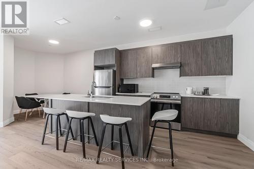 #2 - 30 Dean Park Road, Toronto, ON - Indoor Photo Showing Kitchen With Upgraded Kitchen