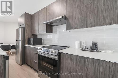 #2 - 30 Dean Park Road, Toronto, ON - Indoor Photo Showing Kitchen With Upgraded Kitchen