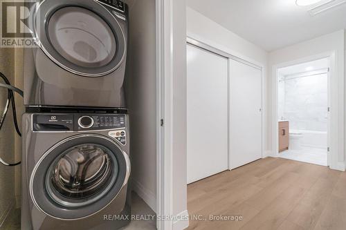 #3 - 30 Dean Park Road, Toronto, ON - Indoor Photo Showing Laundry Room