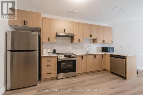 #1 - 30 Dean Park Road, Toronto, ON - Indoor Photo Showing Kitchen