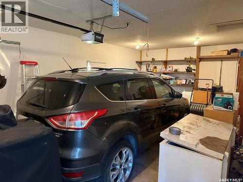 100 Main Street, Aylesbury, SK - Indoor Photo Showing Garage