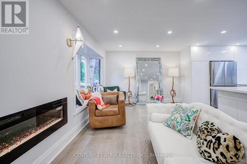 33 Sir Brandiles Place, Markham, ON - Indoor Photo Showing Living Room With Fireplace