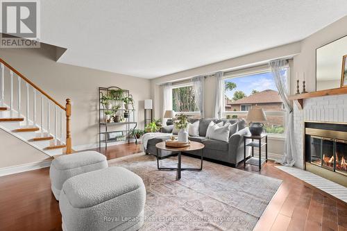 7 - 4605 Donegal Drive, Mississauga, ON - Indoor Photo Showing Living Room With Fireplace