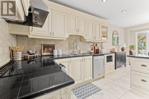 7 - 4605 Donegal Drive, Mississauga, ON - Indoor Photo Showing Kitchen With Double Sink