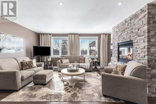 205 Arthur Street, Arnprior, ON - Indoor Photo Showing Living Room With Fireplace