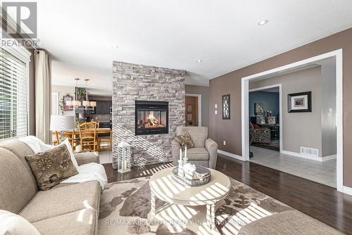 205 Arthur Street, Arnprior, ON - Indoor Photo Showing Living Room With Fireplace