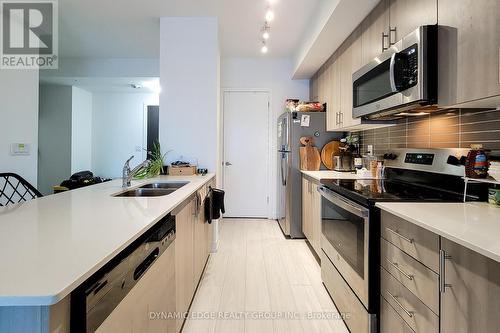 312 - 550 North Service Road, Grimsby, ON - Indoor Photo Showing Kitchen With Stainless Steel Kitchen With Double Sink With Upgraded Kitchen