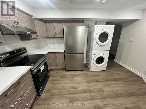 Kitchen with brand new appliances - Bsmt - 41 Morley Crescent, Whitby (Rolling Acres), ON - Indoor Photo Showing Other Room