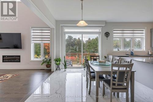 71 Raspberry Rdg Avenue, Caledon, ON - Indoor Photo Showing Dining Room With Fireplace