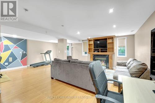 1128 Knotty Pine Grove, Mississauga, ON - Indoor Photo Showing Living Room With Fireplace