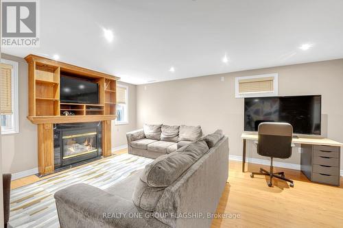1128 Knotty Pine Grove, Mississauga, ON - Indoor With Fireplace