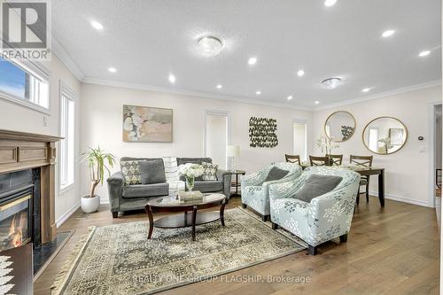 1128 Knotty Pine Grove, Mississauga, ON - Indoor Photo Showing Living Room With Fireplace