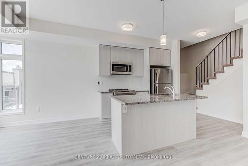 105 - 2550 Castlegate Crossing Drive, Pickering, ON - Indoor Photo Showing Kitchen With Upgraded Kitchen