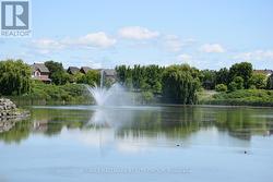 Avalon pond & walking path are steps away - 