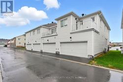 Attached Two-Car Garage with Upper Deck - 