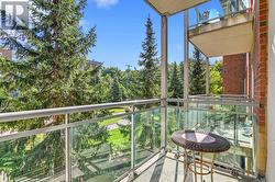 Balcony looks out onto mature trees - 