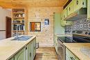Cuisine - 5517  - 5519 Boul. St-Michel, Montréal (Rosemont/La Petite-Patrie), QC  - Indoor Photo Showing Kitchen With Double Sink 
