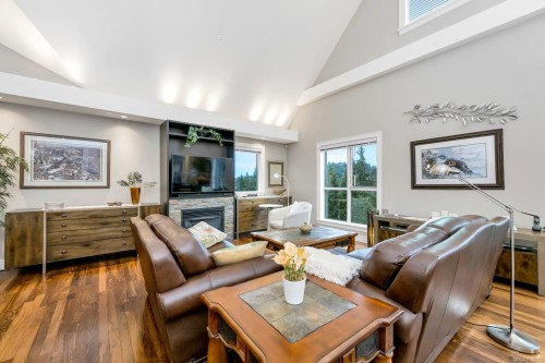 802-1400 Lynburne Pl, Langford, BC - Indoor Photo Showing Living Room With Fireplace