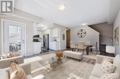 Virtually staged - 13 - 39 Kay Crescent, Guelph (Pineridge/Westminster Woods), ON - Indoor Photo Showing Living Room