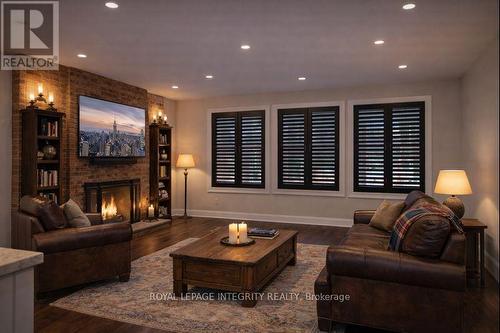 9 Gwynne Avenue, Ottawa, ON - Indoor Photo Showing Living Room With Fireplace