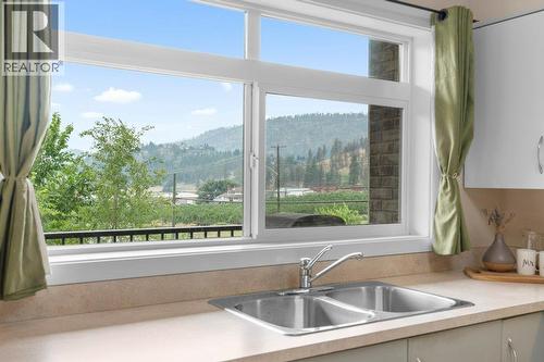View from the Kitchen - 1477 Glenmore Road N Unit# 101B, Kelowna, BC - Indoor Photo Showing Kitchen With Double Sink