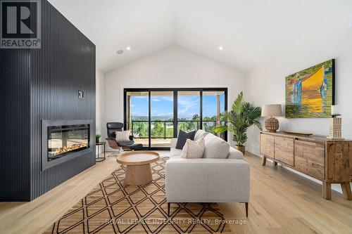 2 - 29 Whittlers Cove Lane, Rideau Lakes, ON - Indoor Photo Showing Living Room With Fireplace