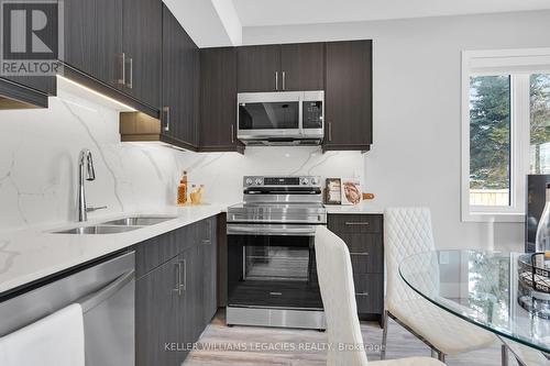 14 - 21 Meadowlily Road N, London East, ON - Indoor Photo Showing Kitchen With Double Sink