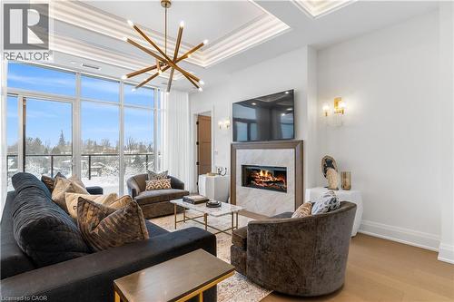 6523 Wellington 7 Road Unit# 509, Elora, ON - Indoor Photo Showing Living Room With Fireplace