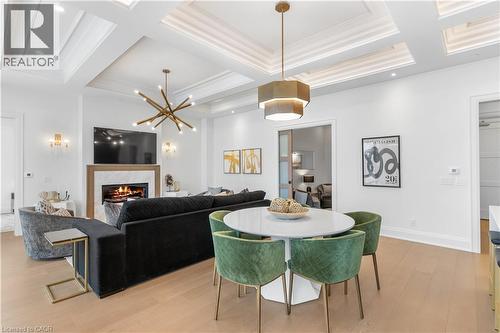 6523 Wellington 7 Road Unit# 509, Elora, ON - Indoor Photo Showing Dining Room With Fireplace