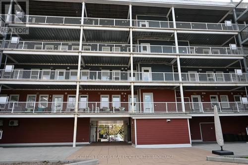 207 - 130 Water Street, Gananoque, ON - Outdoor With Balcony With Facade