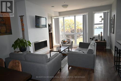 207 - 130 Water Street, Gananoque, ON - Indoor Photo Showing Living Room With Fireplace