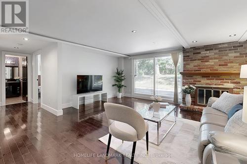 61 Whittaker Crescent, Toronto, ON - Indoor Photo Showing Living Room With Fireplace