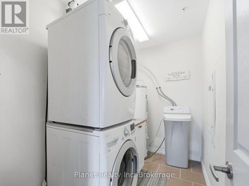 204 - 2 Colonial Drive, Guelph (Pineridge/Westminster Woods), ON - Indoor Photo Showing Laundry Room