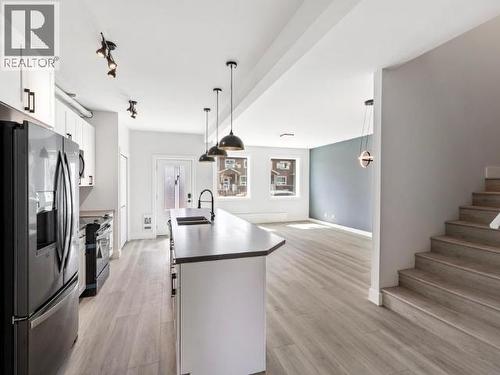 175 Witch Hazel Drive, Whitehorse, YT - Indoor Photo Showing Kitchen With Double Sink