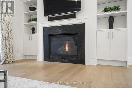 1882 Sherwood Forrest Circle, Mississauga, ON - Indoor Photo Showing Living Room With Fireplace