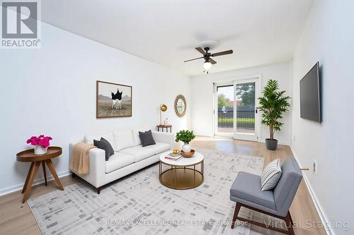 Virtually Staged - 3692 Crabtree Crescent, Mississauga, ON - Indoor Photo Showing Living Room