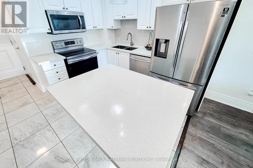 622 - 2486 Old Bronte Road, Oakville, ON - Indoor Photo Showing Kitchen With Double Sink