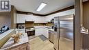 305 2203 Angus Street, Regina, SK  - Indoor Photo Showing Kitchen With Double Sink 