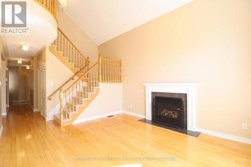 6 Bellingham Place, Ottawa, ON - Indoor Photo Showing Living Room With Fireplace