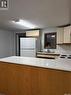 114 2Nd Avenue, Big River, SK  - Indoor Photo Showing Kitchen With Double Sink 