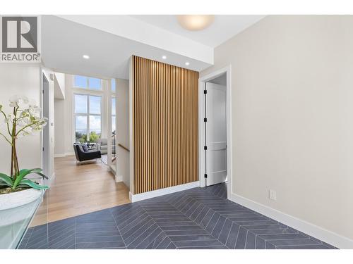View into home from front entry. - 4964 Bucktail Lane, Kelowna, BC - Indoor Photo Showing Other Room