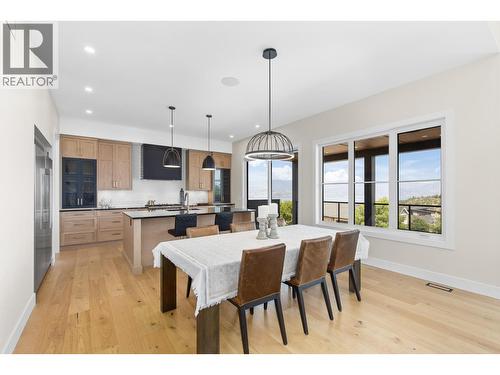 Open style living, dining and kitchen. - 4964 Bucktail Lane, Kelowna, BC - Indoor