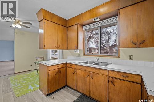 441 28Th Street E, Prince Albert, SK - Indoor Photo Showing Kitchen With Double Sink