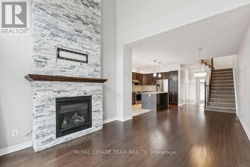 525 Rowers Way, Ottawa, ON - Indoor Photo Showing Living Room With Fireplace