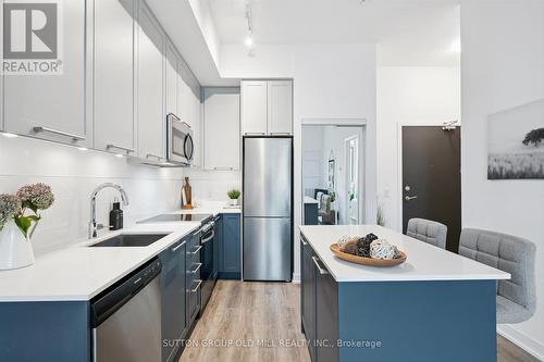 101 - 25 Neighbourhood Lane, Toronto, ON - Indoor Photo Showing Kitchen With Upgraded Kitchen