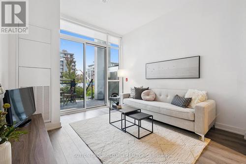 101 - 25 Neighbourhood Lane, Toronto, ON - Indoor Photo Showing Living Room