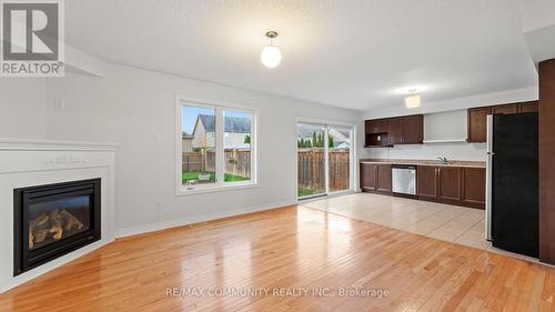 83 Swenson Street, New Tecumseth, ON - Indoor Photo Showing Living Room With Fireplace